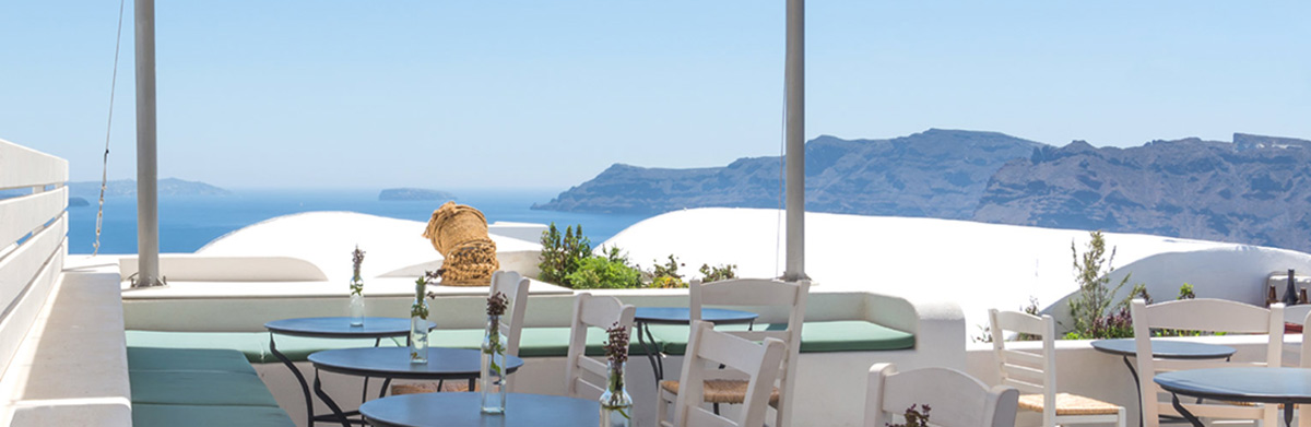 restaurant in Oia Santorini with rooftop sunset view